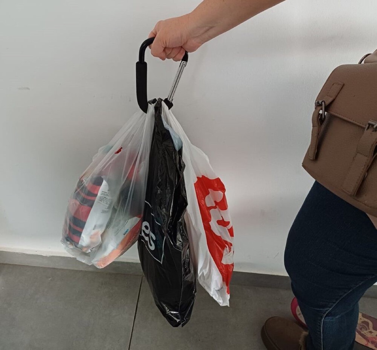 A carabiner turns your bag into a versatile carry-all for any situation!